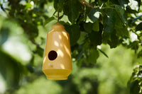 Vogelhuisje uit bamboevezel okergeel