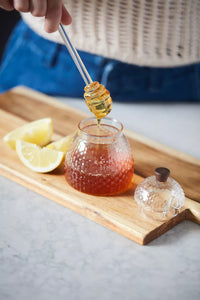 Set of honey jar and dipper