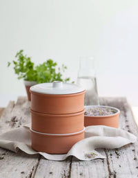 Terracotta kiemtoren met 3 schalen