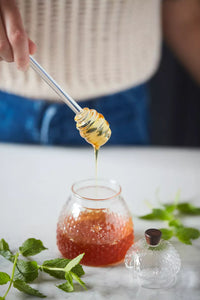 Set of honey jar and dipper