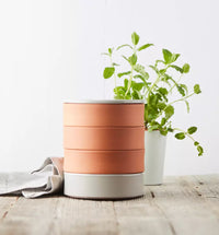 Terracotta kiemtoren met 4 schalen