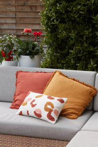 Coussin décoratif en 100% coton recyclé terre cuite