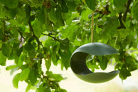 Bird feeder made of bamboo fiber in dark forest green