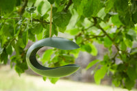 Bird feeder made of bamboo fiber in dark forest green
